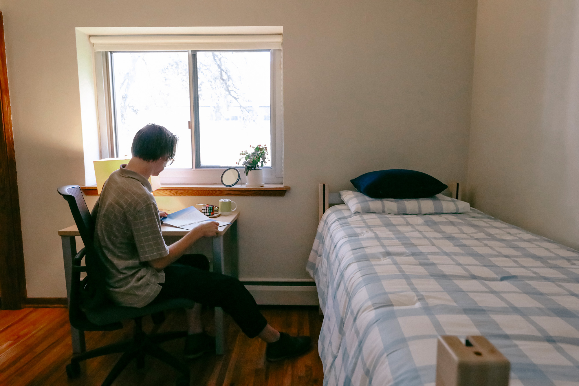 Student at desk in 150 apartments