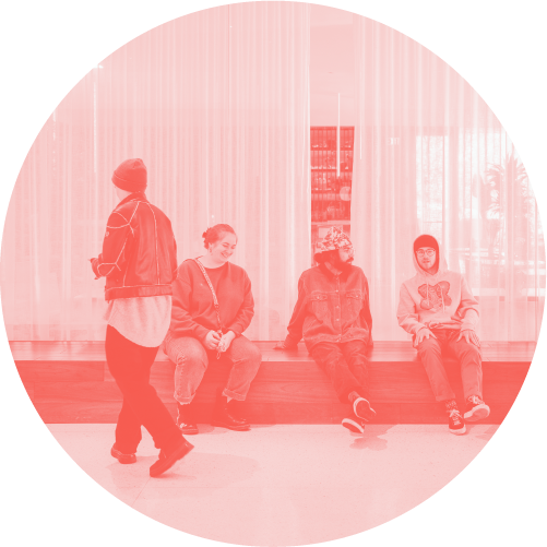 Students sitting in MCAD's gallery