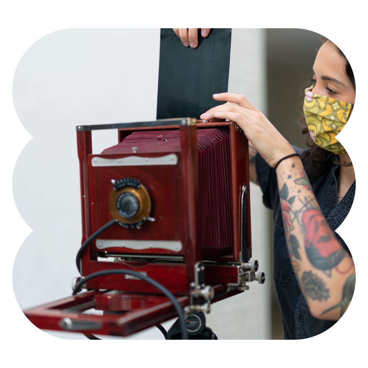 Student working with film camera