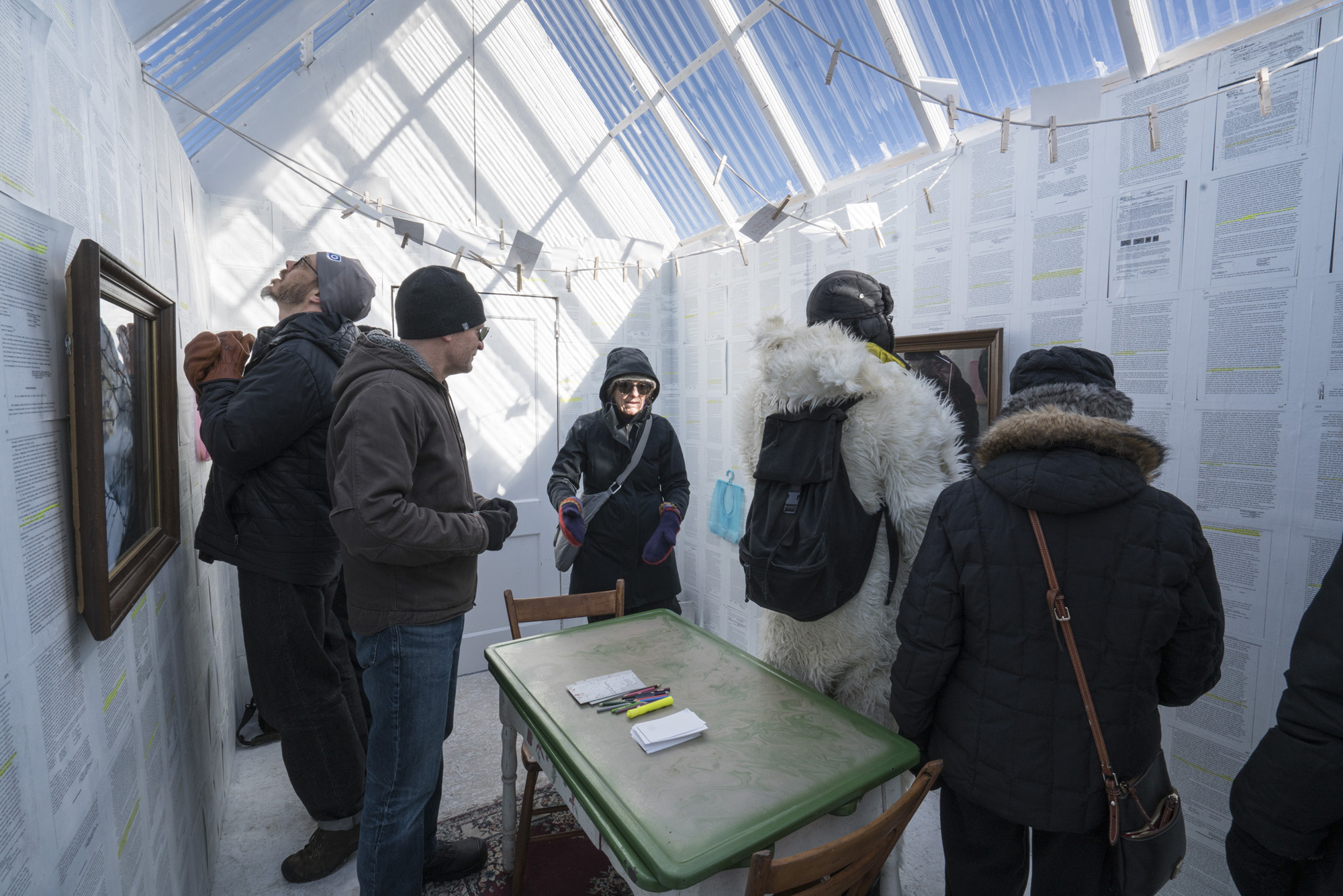 People inside an art shanty