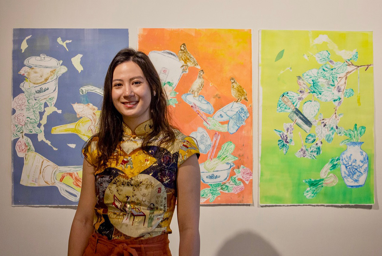 Anika pictured with her solo exhibition, Chinese-ish.