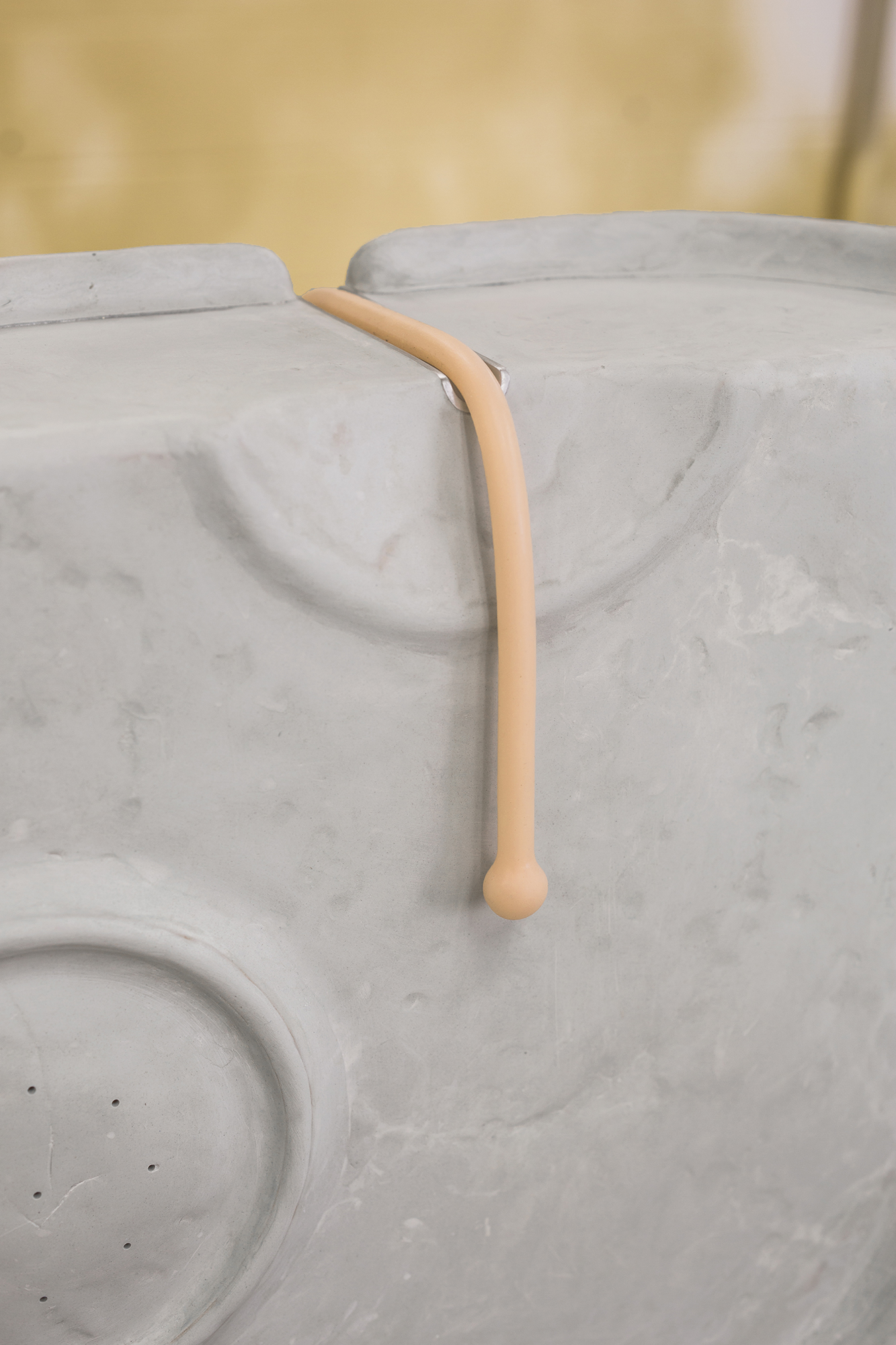 Eavesdrop (detail), 2017, Cast Silicone Bungee Cord, Toddler’s High Chair Tray, Epoxy Putty, Aluminum, MDF, 22 x 17 x 7 inches