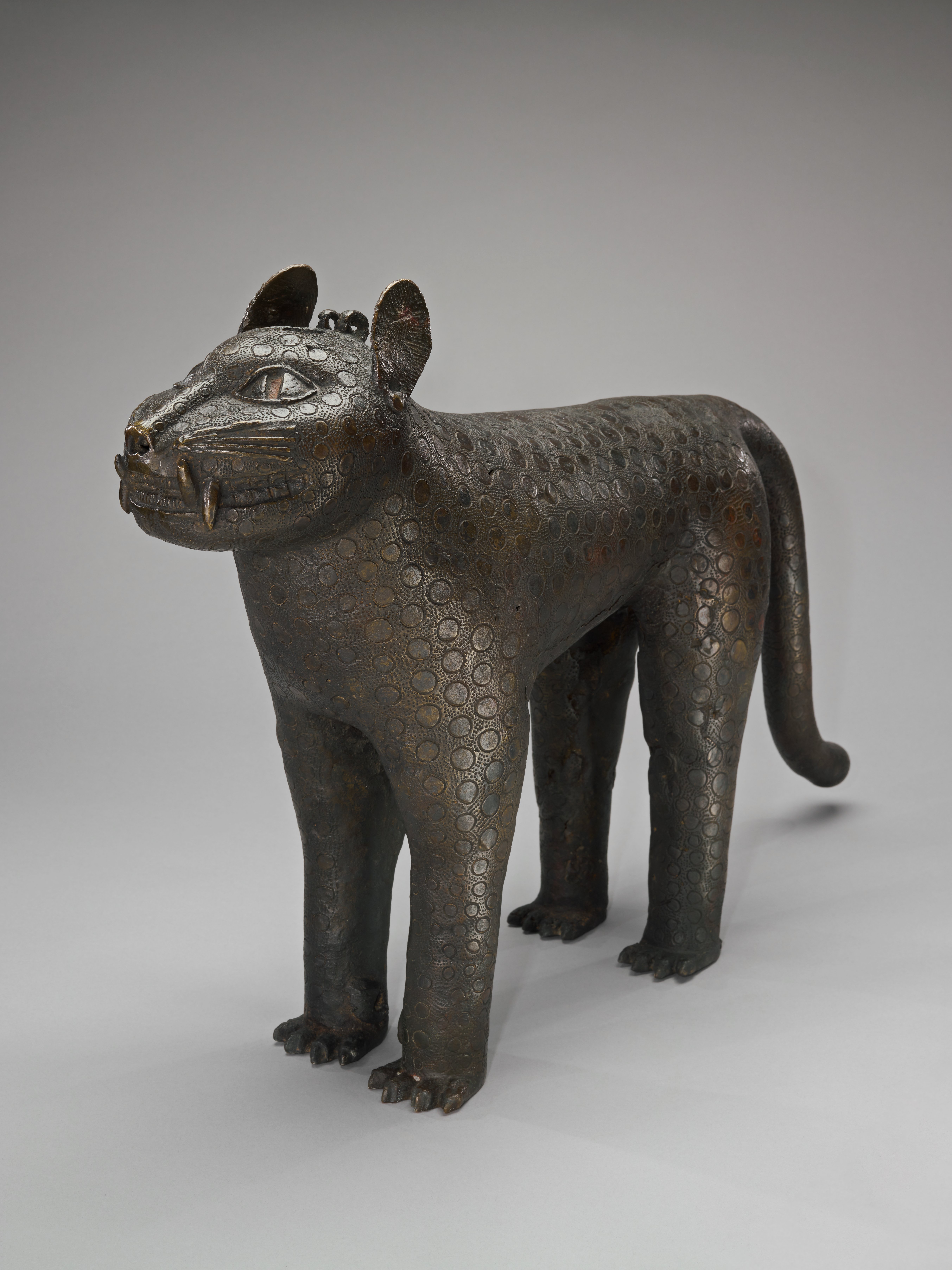 Water Pitcher in the shape of a sneering leopard.