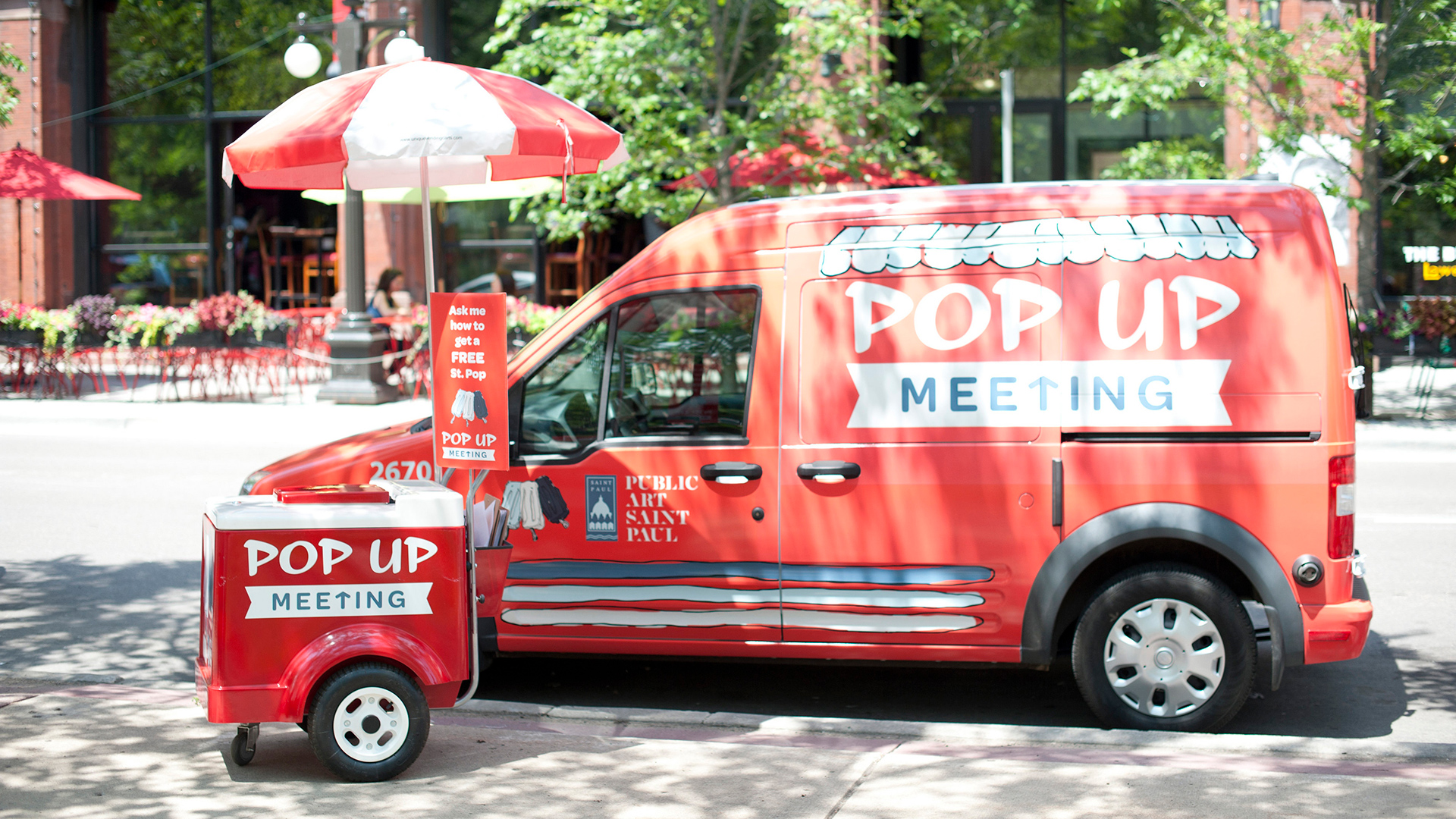 Picture of a can and cooler that say pop-up meeting