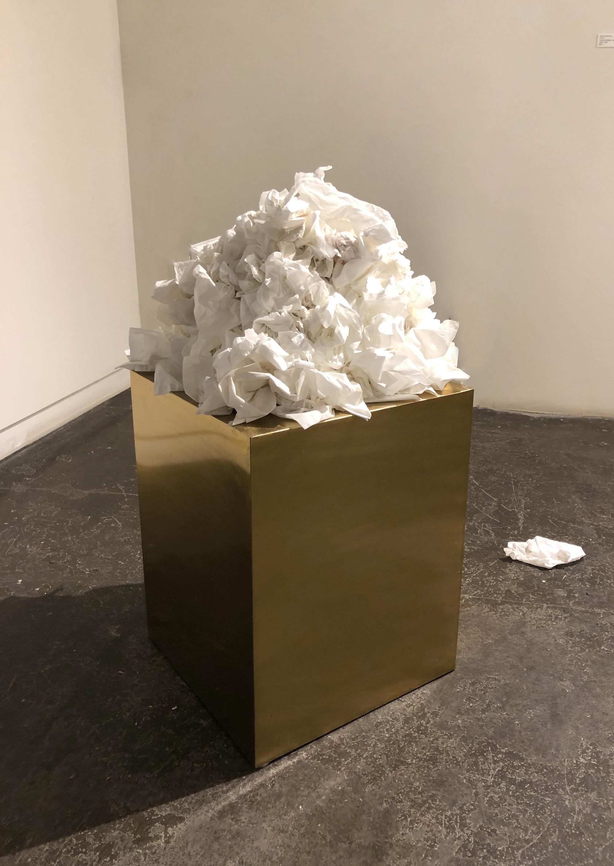 Emmett Ramstad, It’s ok, 2020, Golden pedestal, used tissues