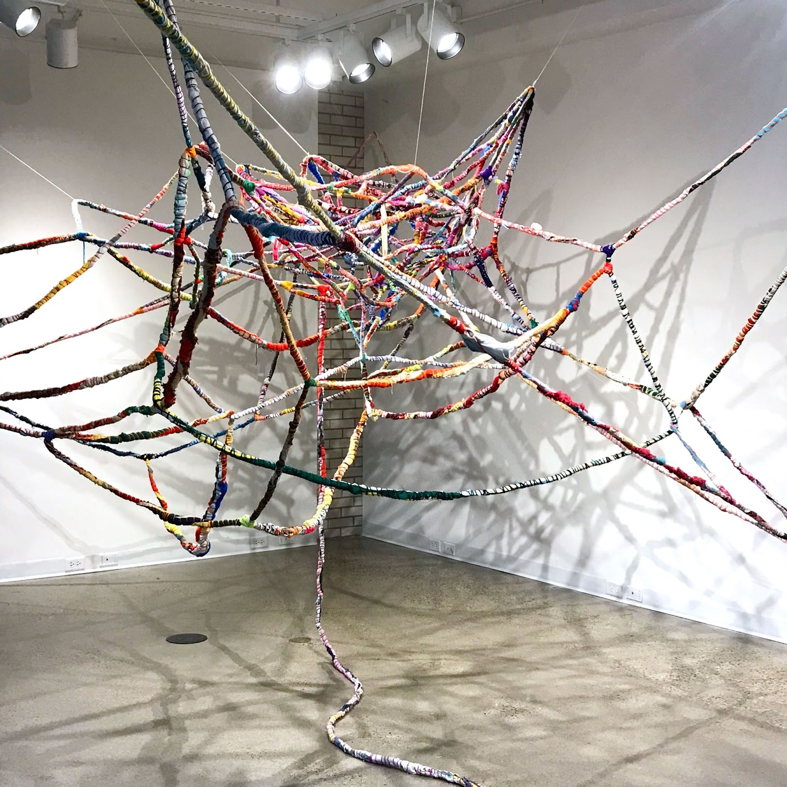 Installation by Lily Fridell made of handmade yarn.