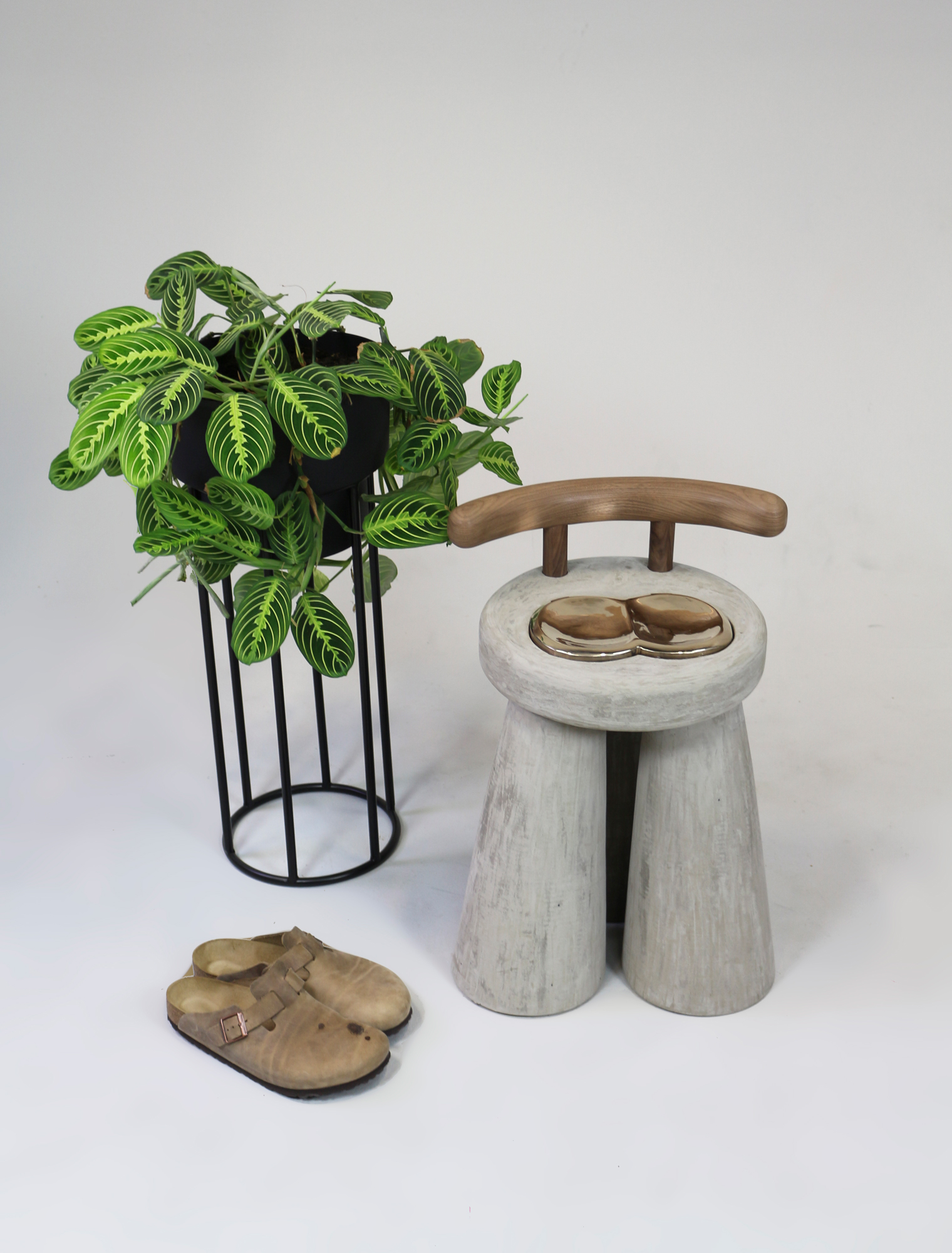 handmade stool next to a houseplant