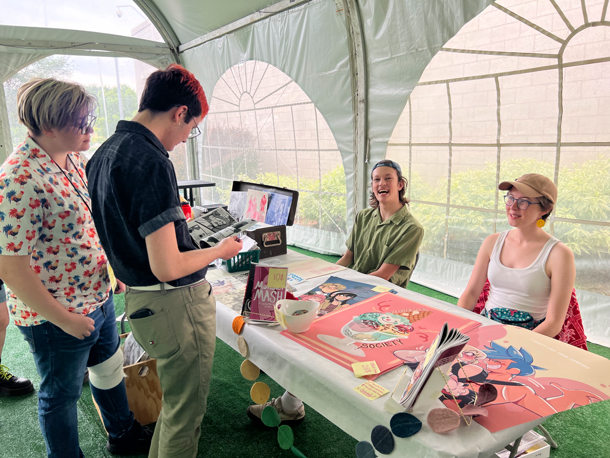 Fine Arts student Max Paulin and Illustration student Ella Parish at Zine Fest