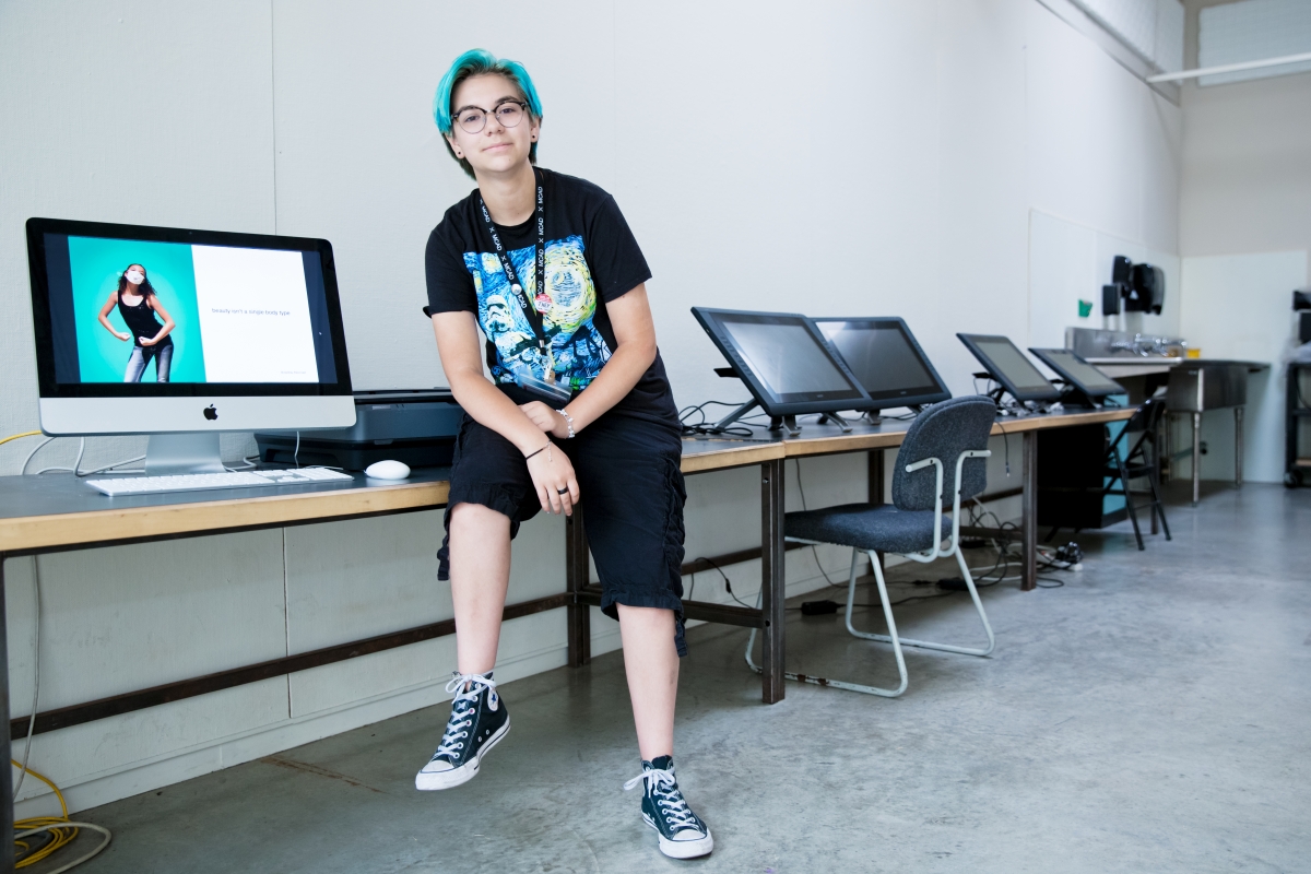 Bleu shows work in one of MCAD's computer labs. Photo by Grace Olson. 