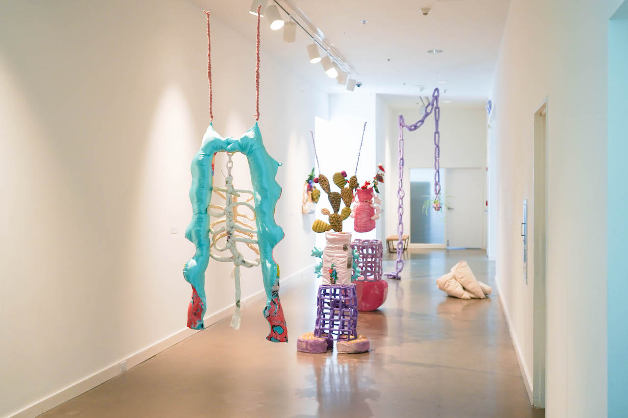 Installation image of Ivonne Yáñez's soft sculptures installed at the Rochester Art Center.