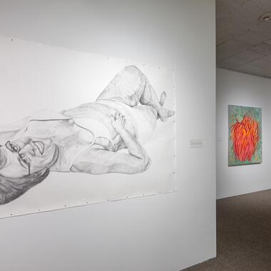 Susan Ahlfs, Rachael Elam, 2015, charcoal on paper (left); installation photo by Rik Sferra.