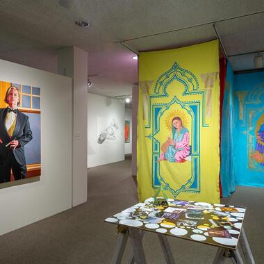 Olson (left); Meena Mangalvedhekan, DIY Portrait Forum, 2016, mixed media (center); Al-Mansour (background); installation photo by Rik Sferra.