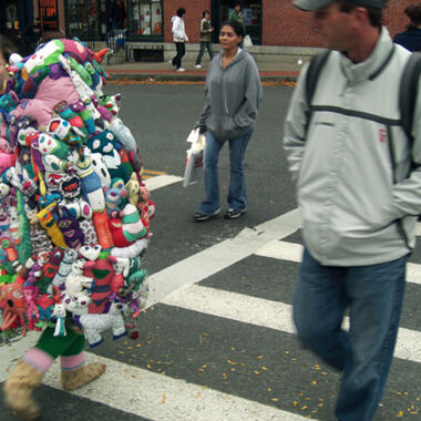 Angela Zammarelli, Portable Doll Fort, 2007-2011, homemade dolls, stuffing, thread, video player, electric cord, and yarn Dimensions: 3.5’x 2.5’x 2.5’