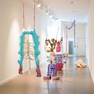 Installation image of Ivonne Yáñez's soft sculptures installed at the Rochester Art Center.