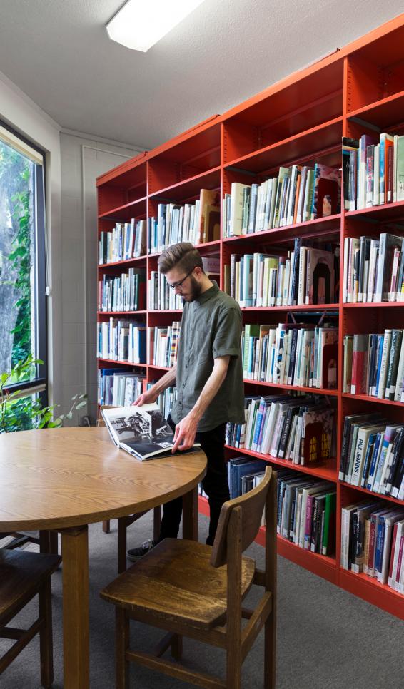 Student reading books in the library