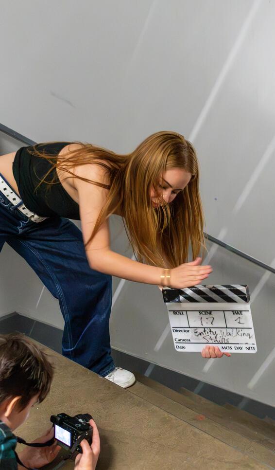 Teen students creating a film on MCAD's campus.