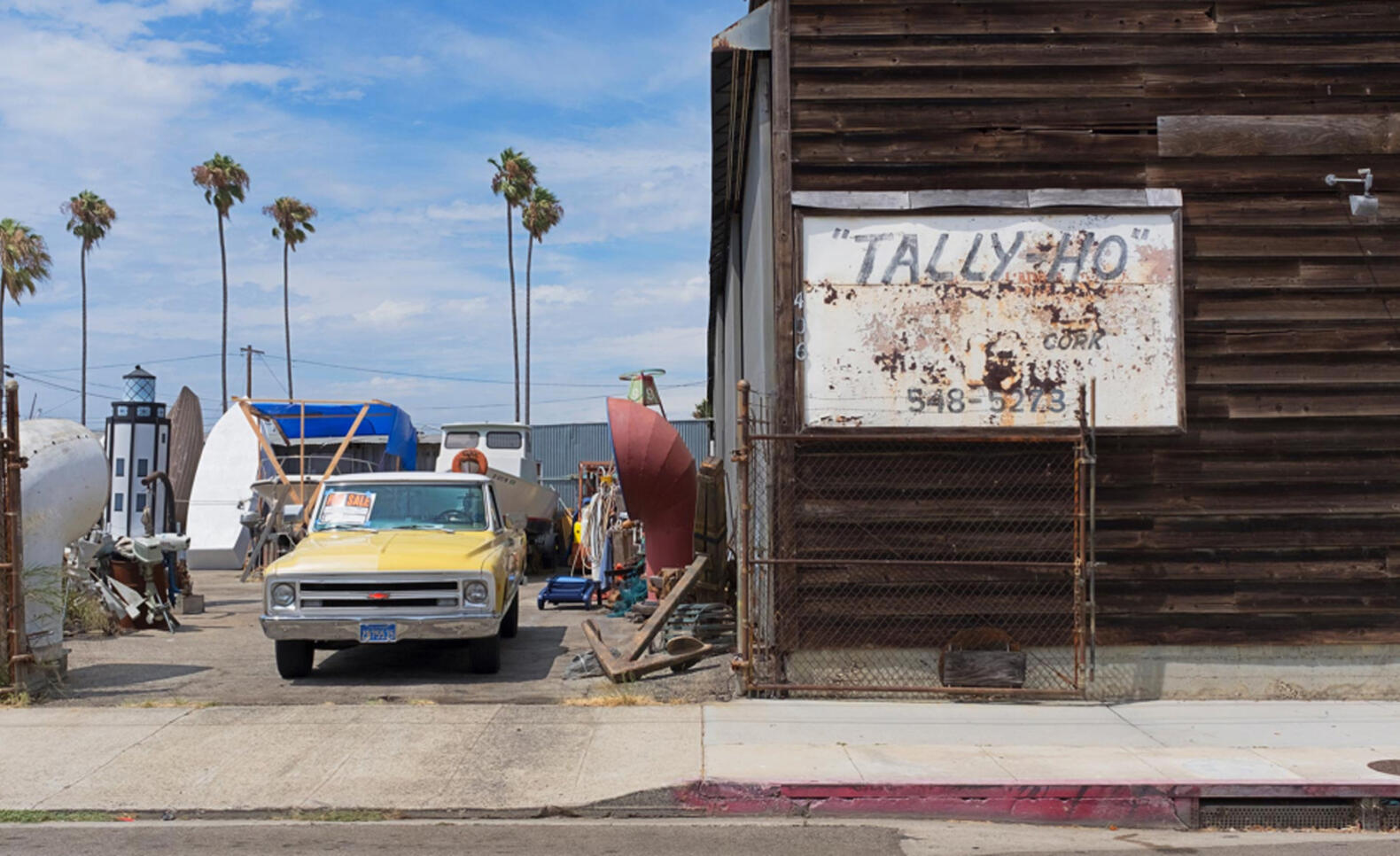 Photograph of San Pedro, near Long Beach, photograph has an old car and several different objects laying around ; Luke Erickson