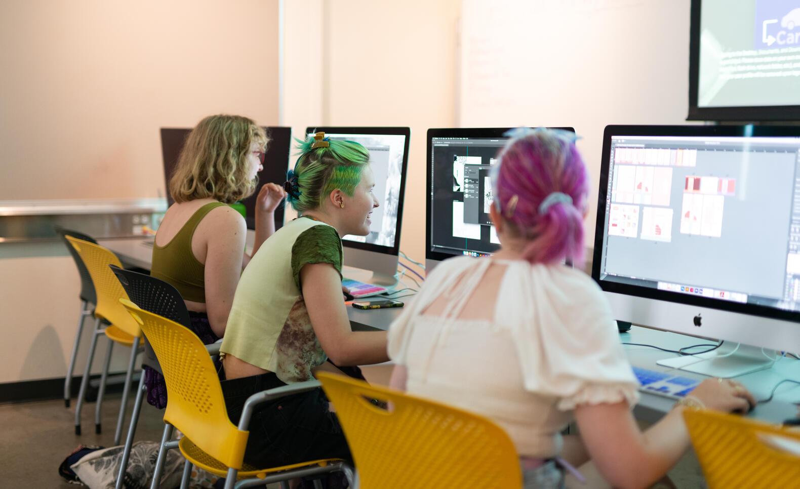 MCAD Graphic Design students working in the digital lab.