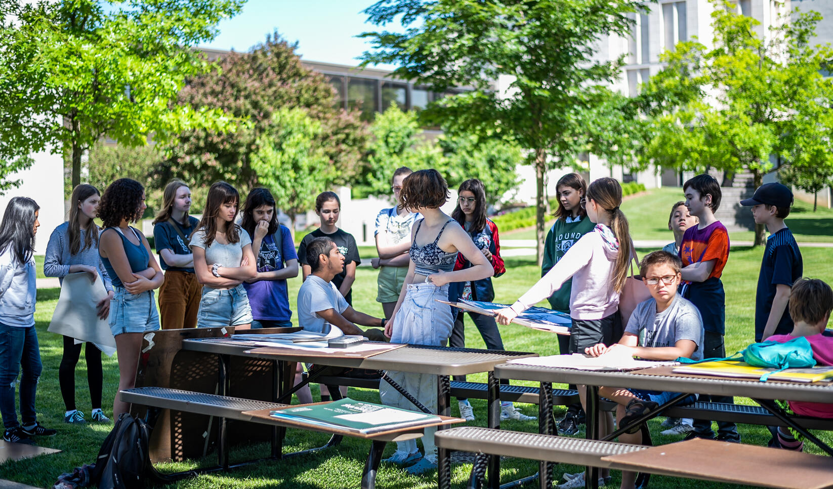 Students standing outside in drawing class