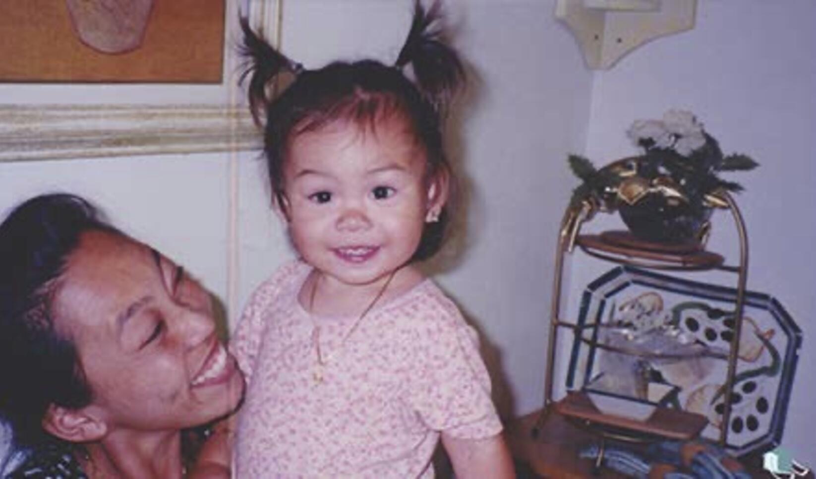 A photo of a young girl and her mother