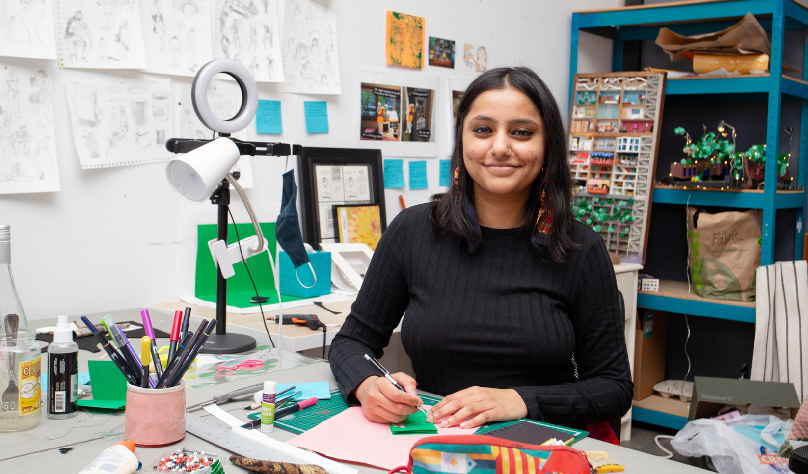 Image of Roshan Ganu working in her studio