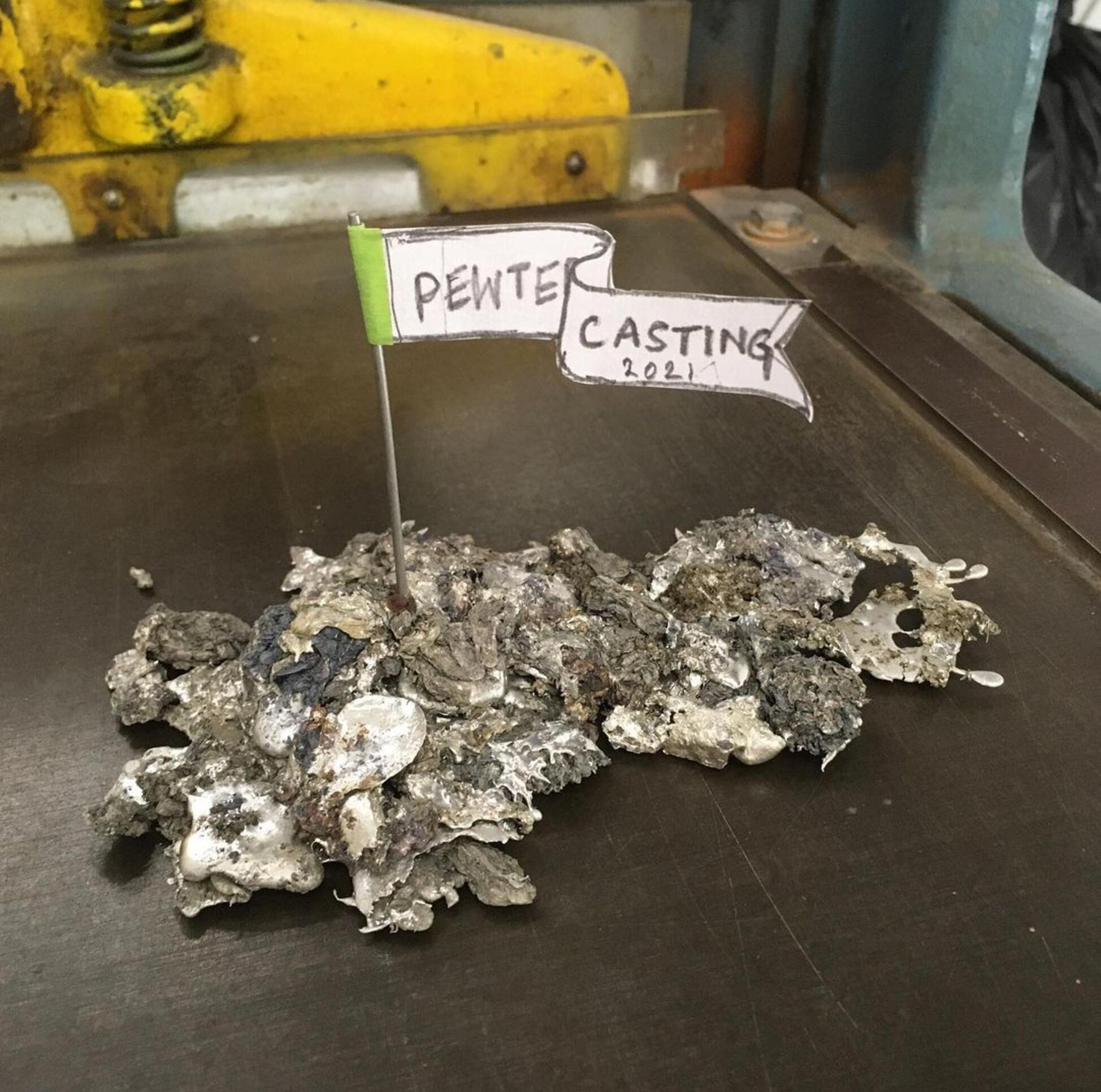Pewter casting pile