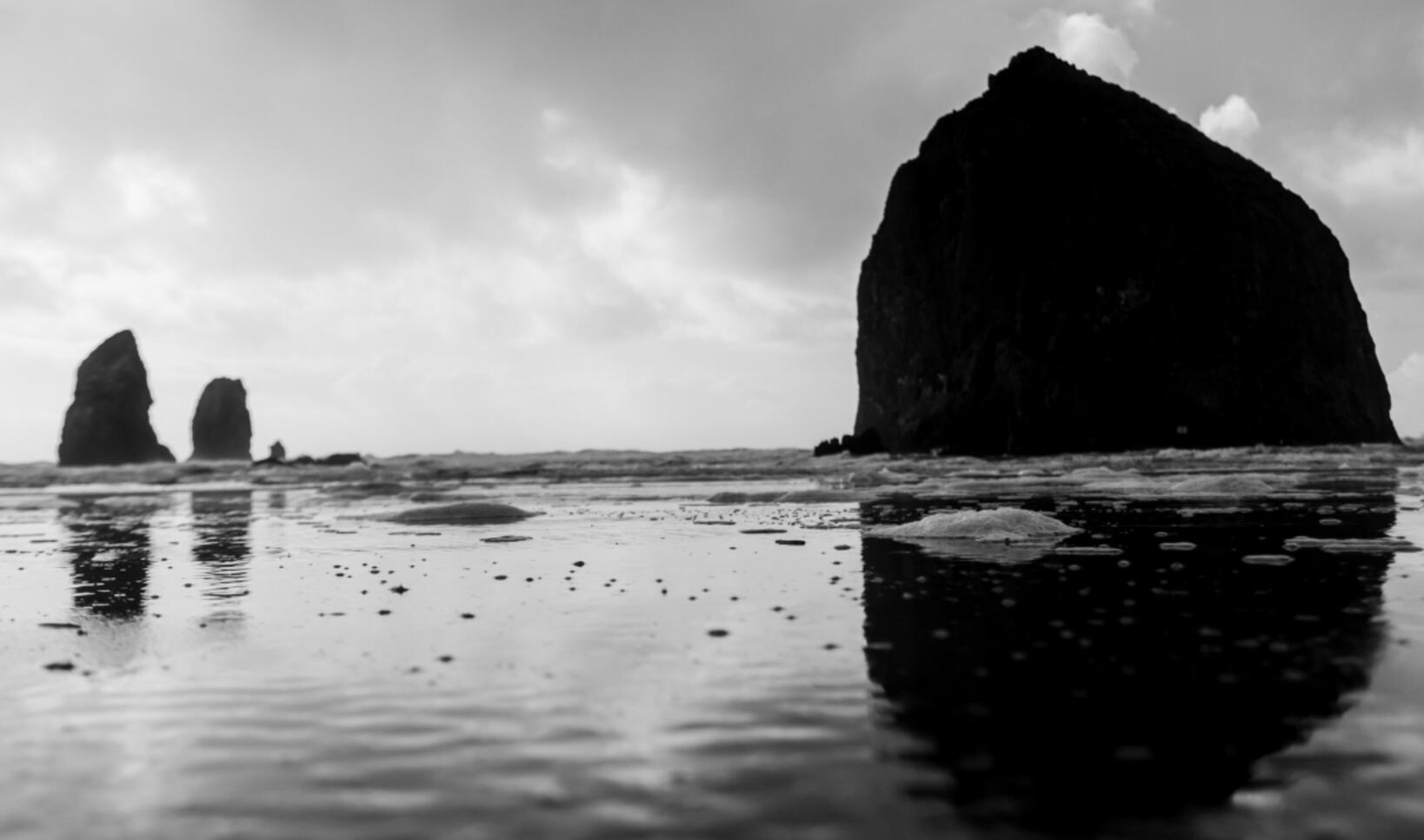 "Cannon Beach Reflections" by Dan Nolin. ; "Cannon Beach Reflections" by Dan Nolin