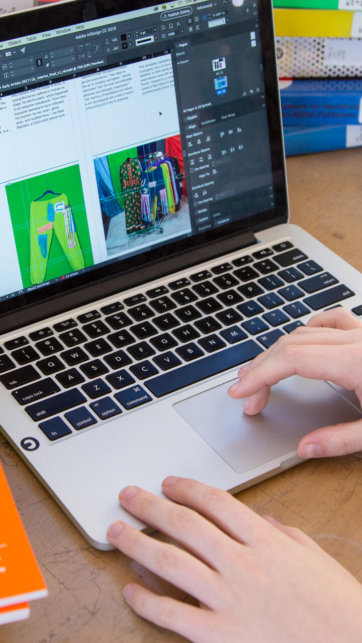 Close up of someone working on their laptop