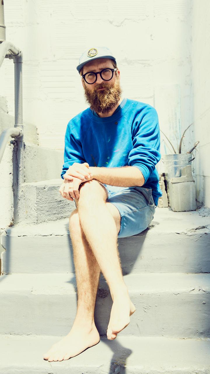 Mike Perry sitting on steps