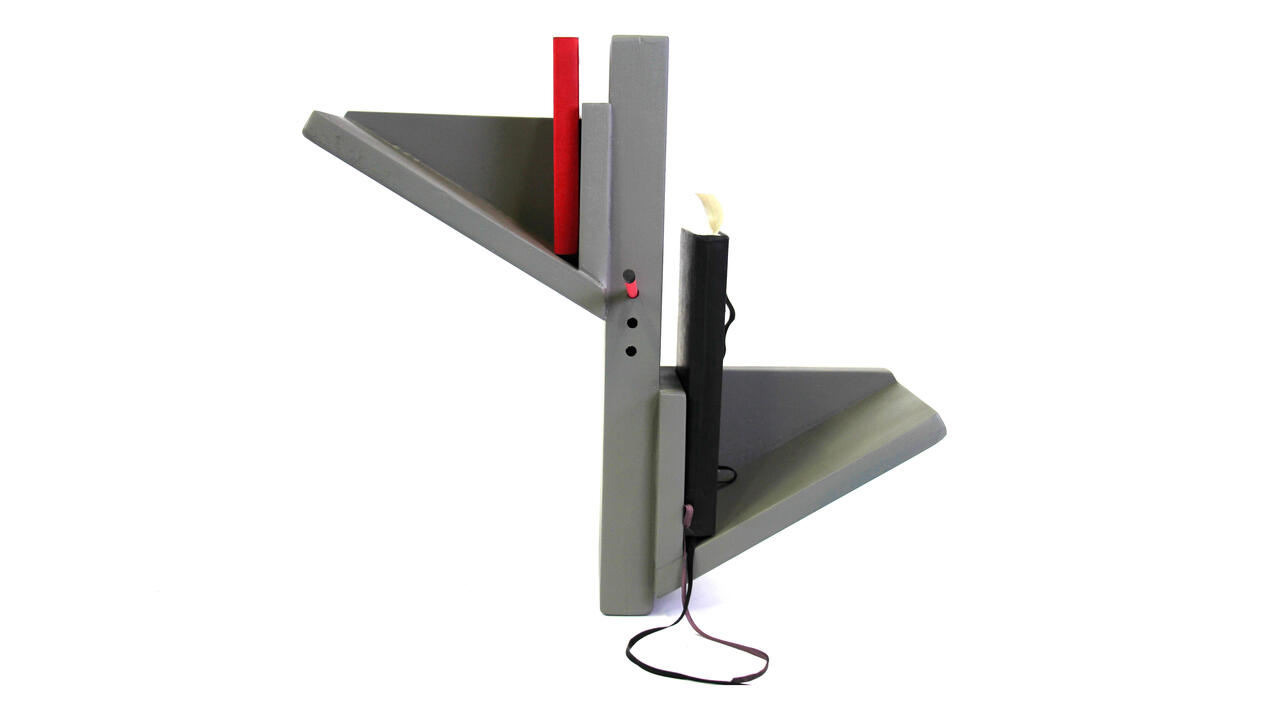 Triangular wall shelf