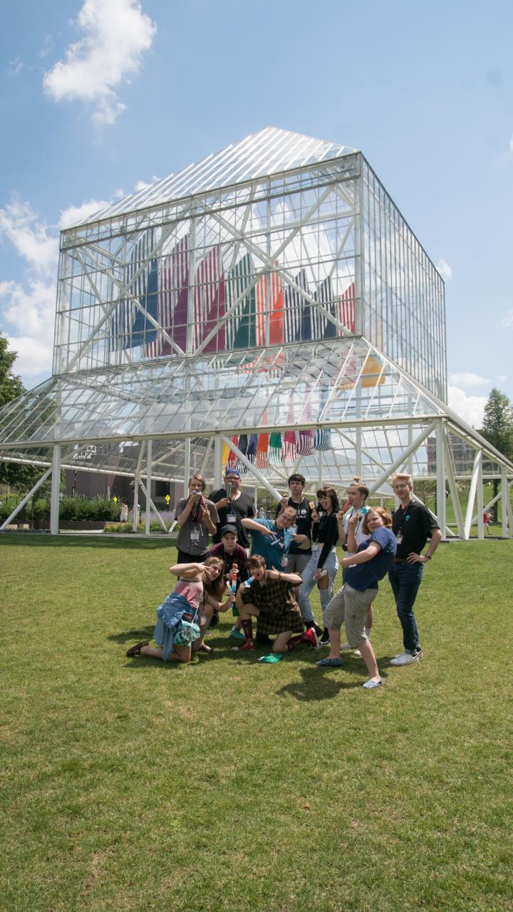 Pre-College students stand in front of a Walker sculpture