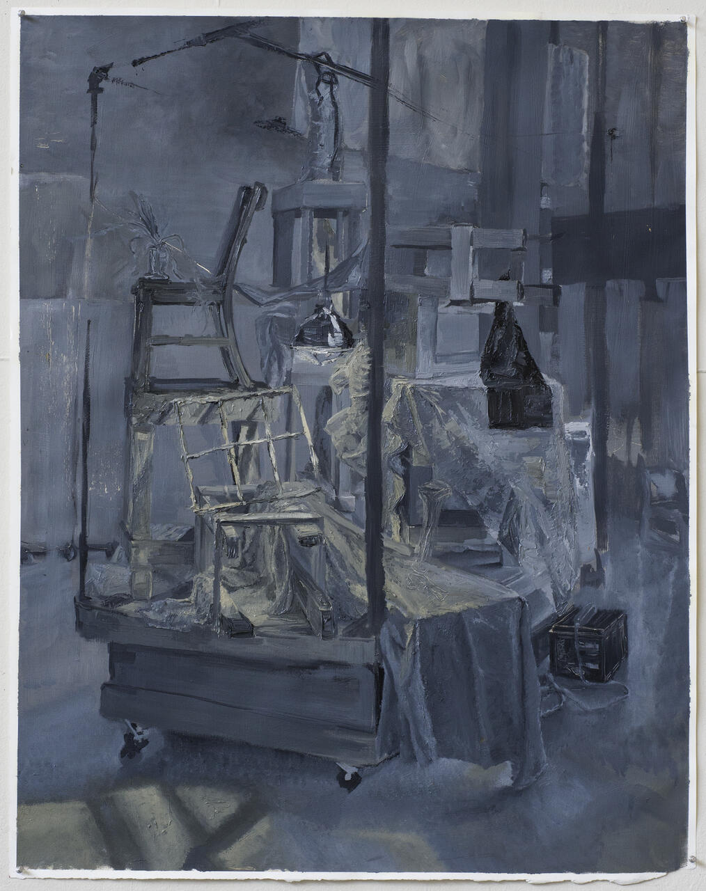Wide set perspective still life painted in cool gray tones.