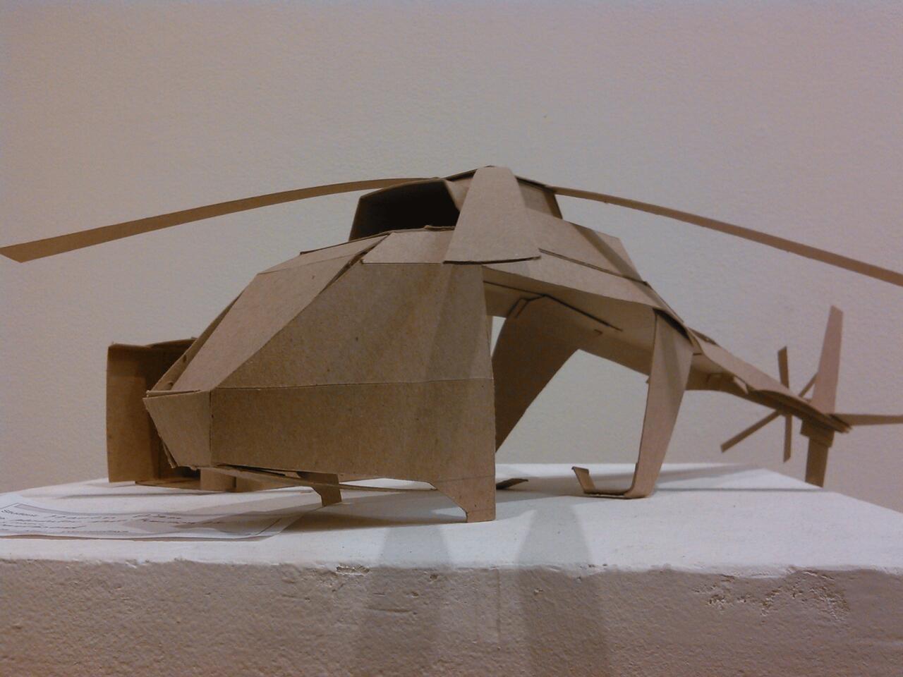 Free standing cardboard sculpture with propellers. 