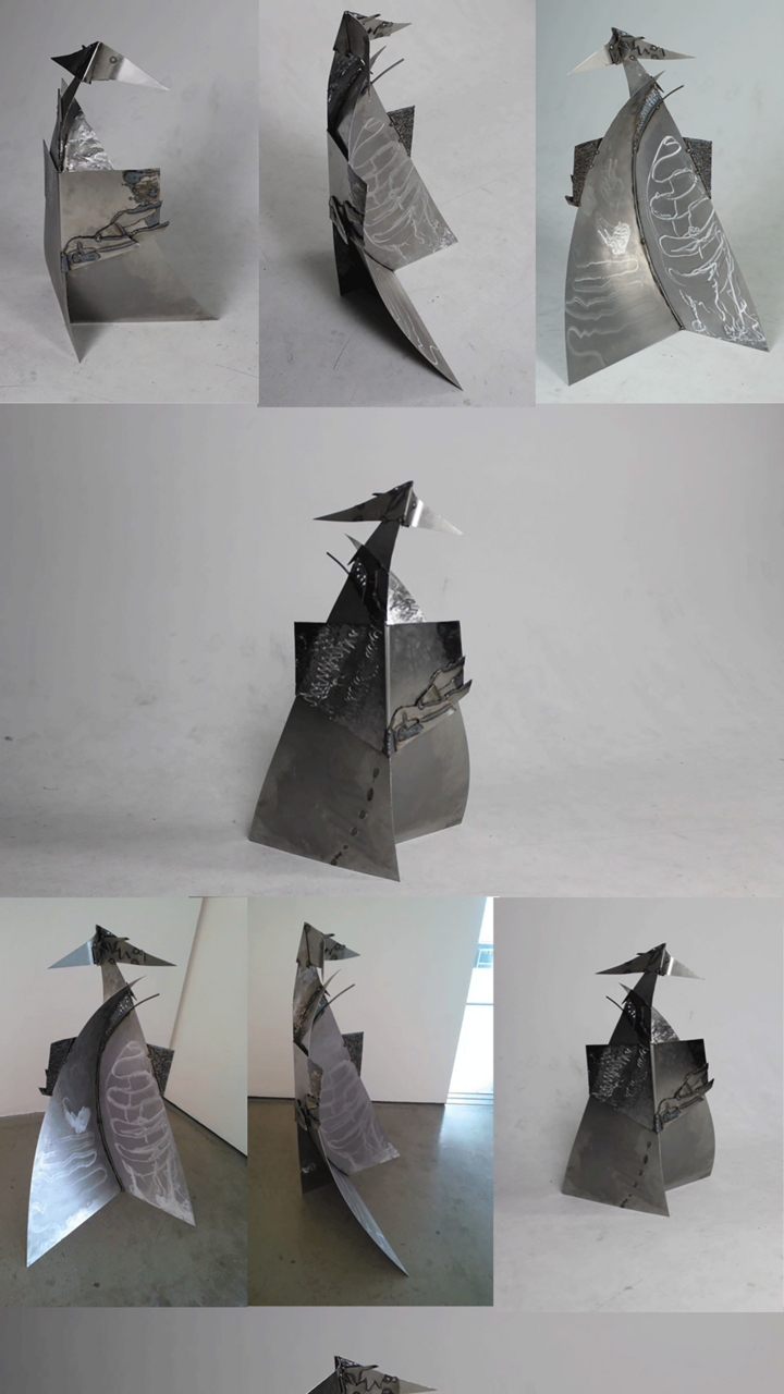 Steel sculpture of a fishtail.