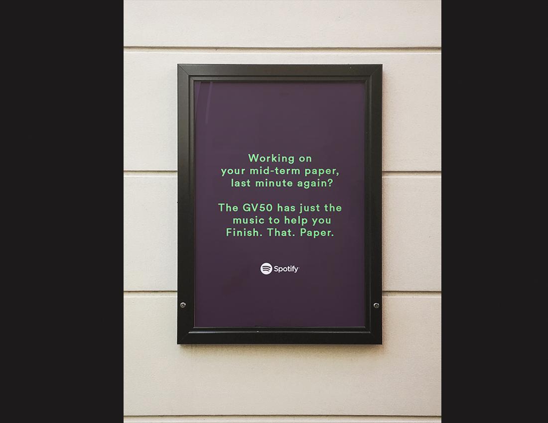 Bus, wall, and poster advertisements for Spotify's viral top 50 playlist.