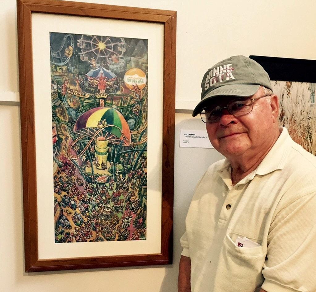 MCAD Alum Bill Manske standing beside one of his works. 