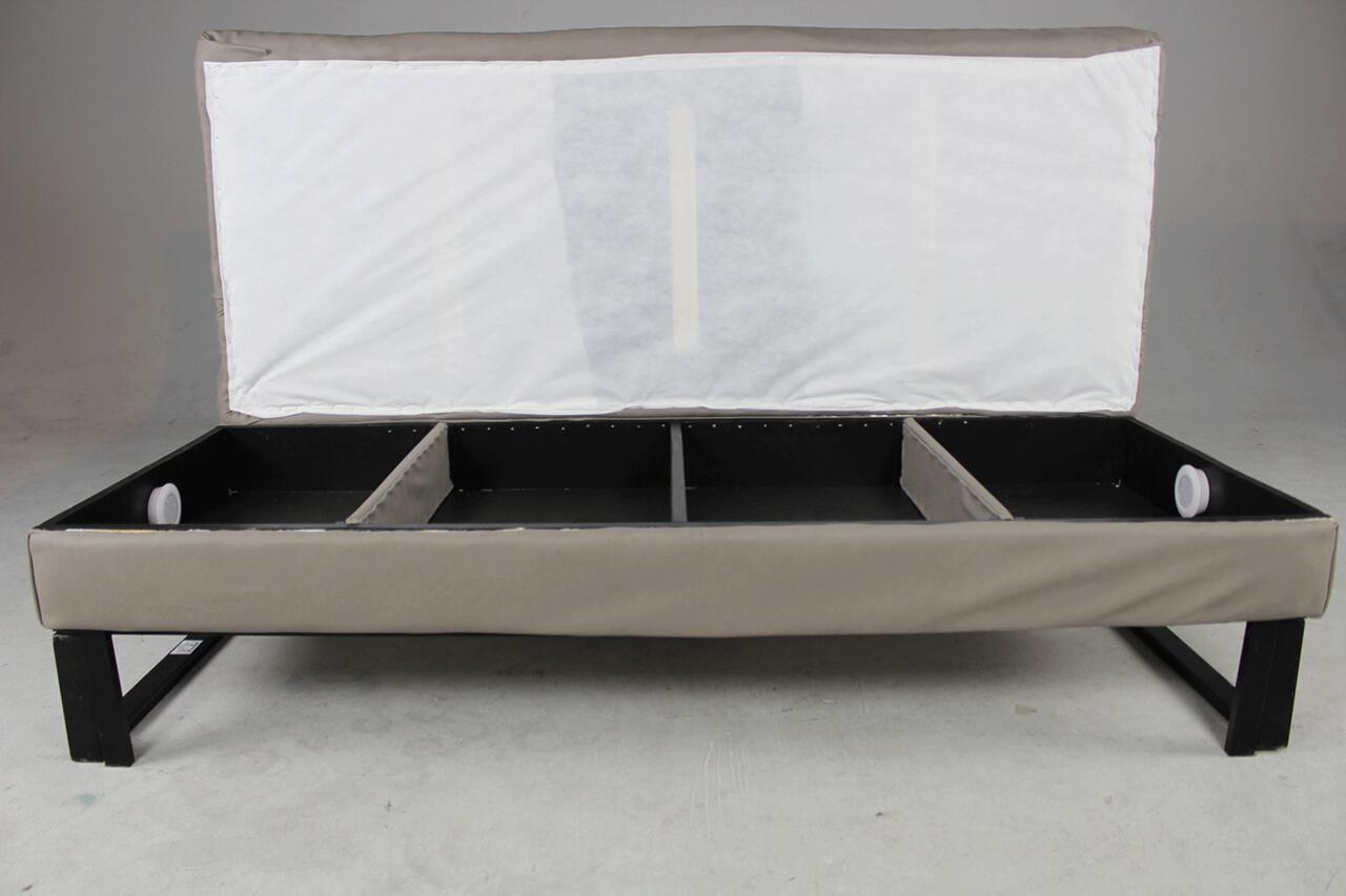 Inside of gray futon designed by the artist.