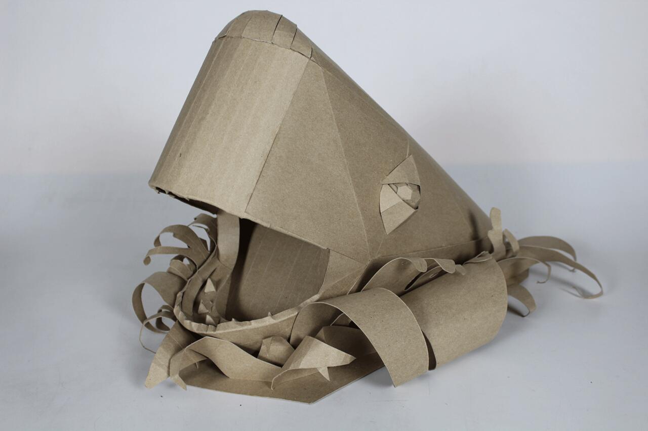 Cardboard sculpture inspired by "Moby Dick."