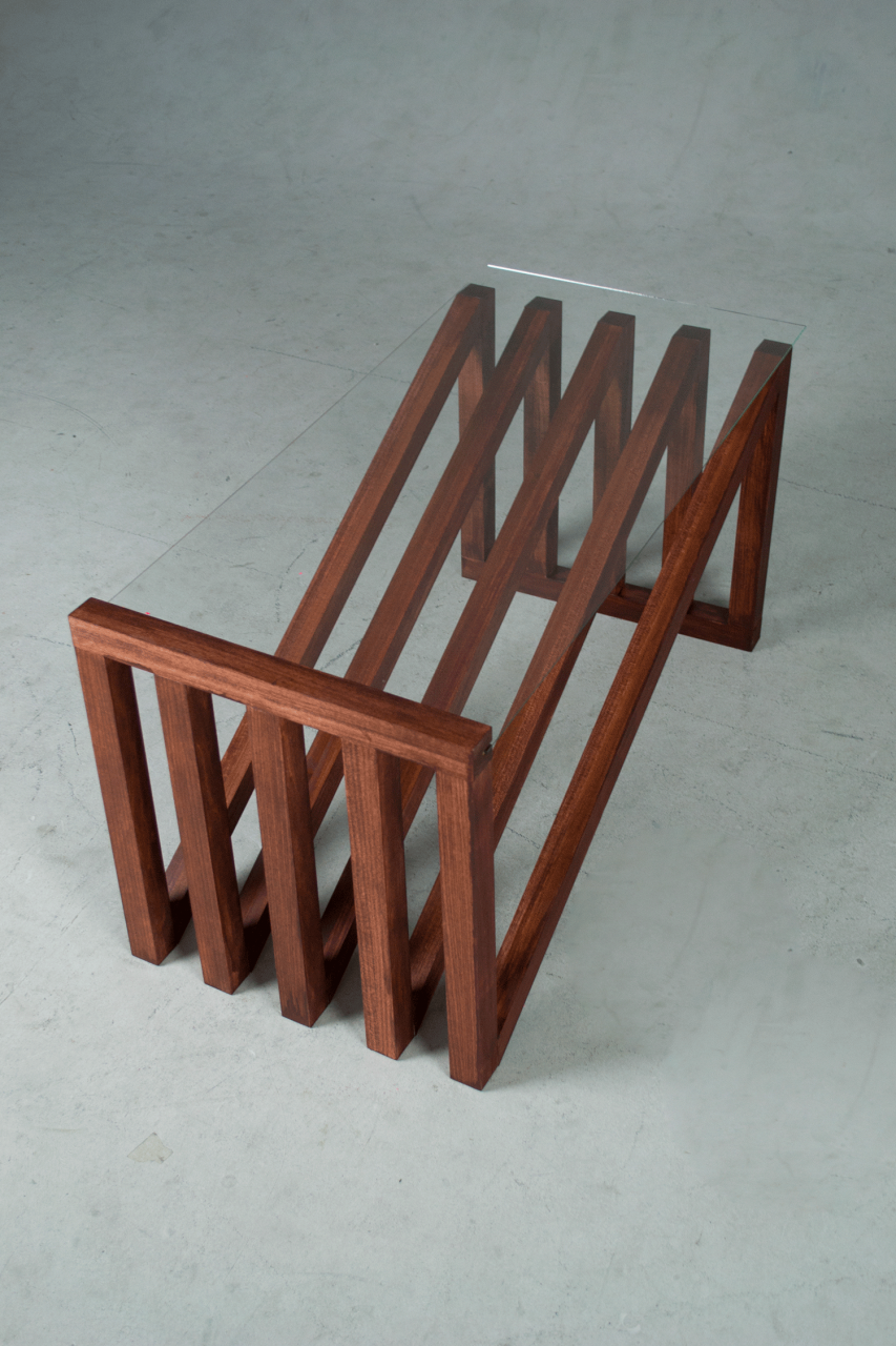 Coffee table made out of wood and glass