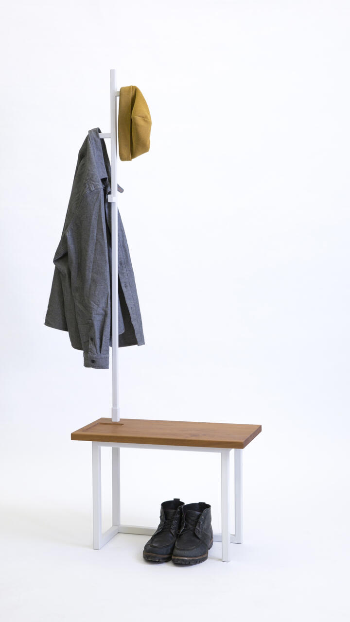 Installation of human present using coat, hat, and shoes