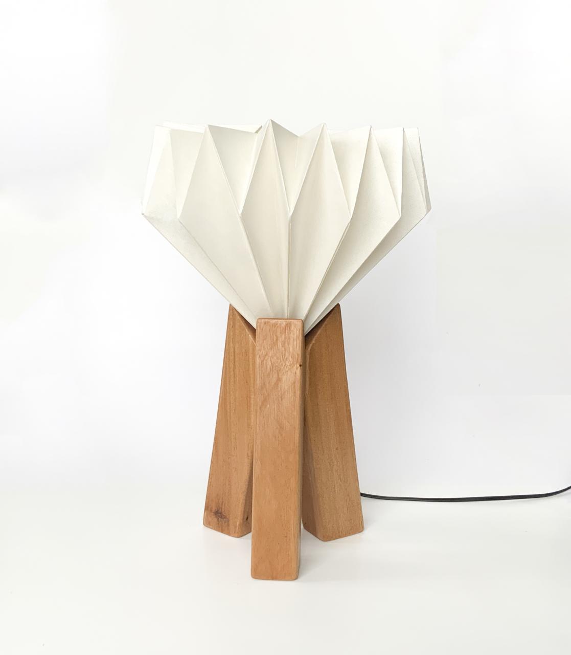 Innovative lamp design focusing on three wooden pillars.