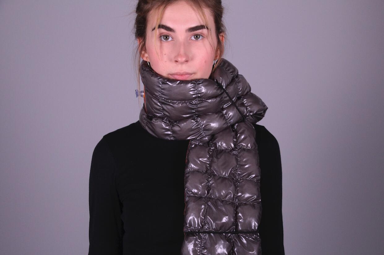 Model wearing an inflatable scarf product design.