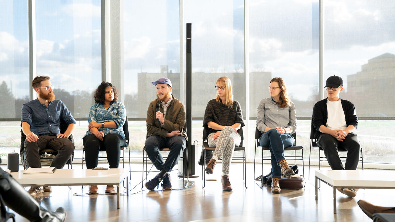 A group of people in conversation