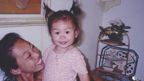 A photo of a young girl and her mother