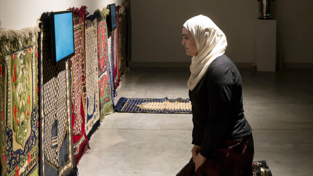 Essma Imady in front of their installation