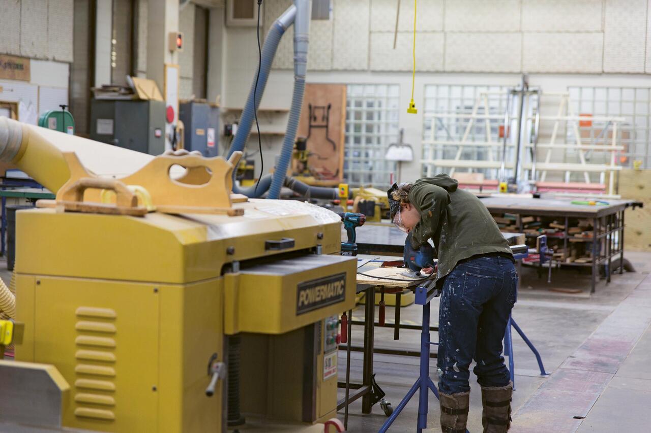 Person working in MCAD's 3D Shop