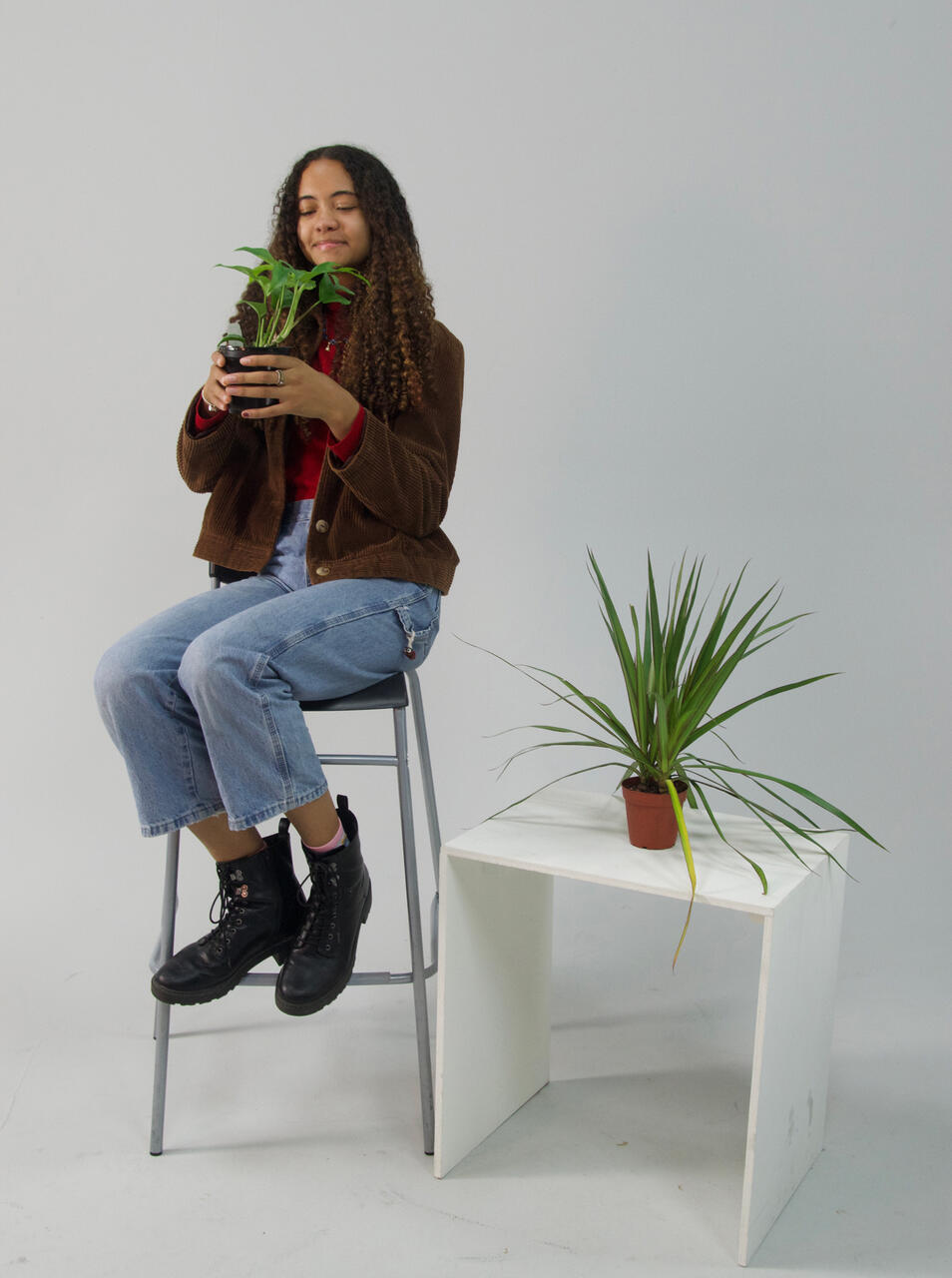 Portrait of Makayla with plants