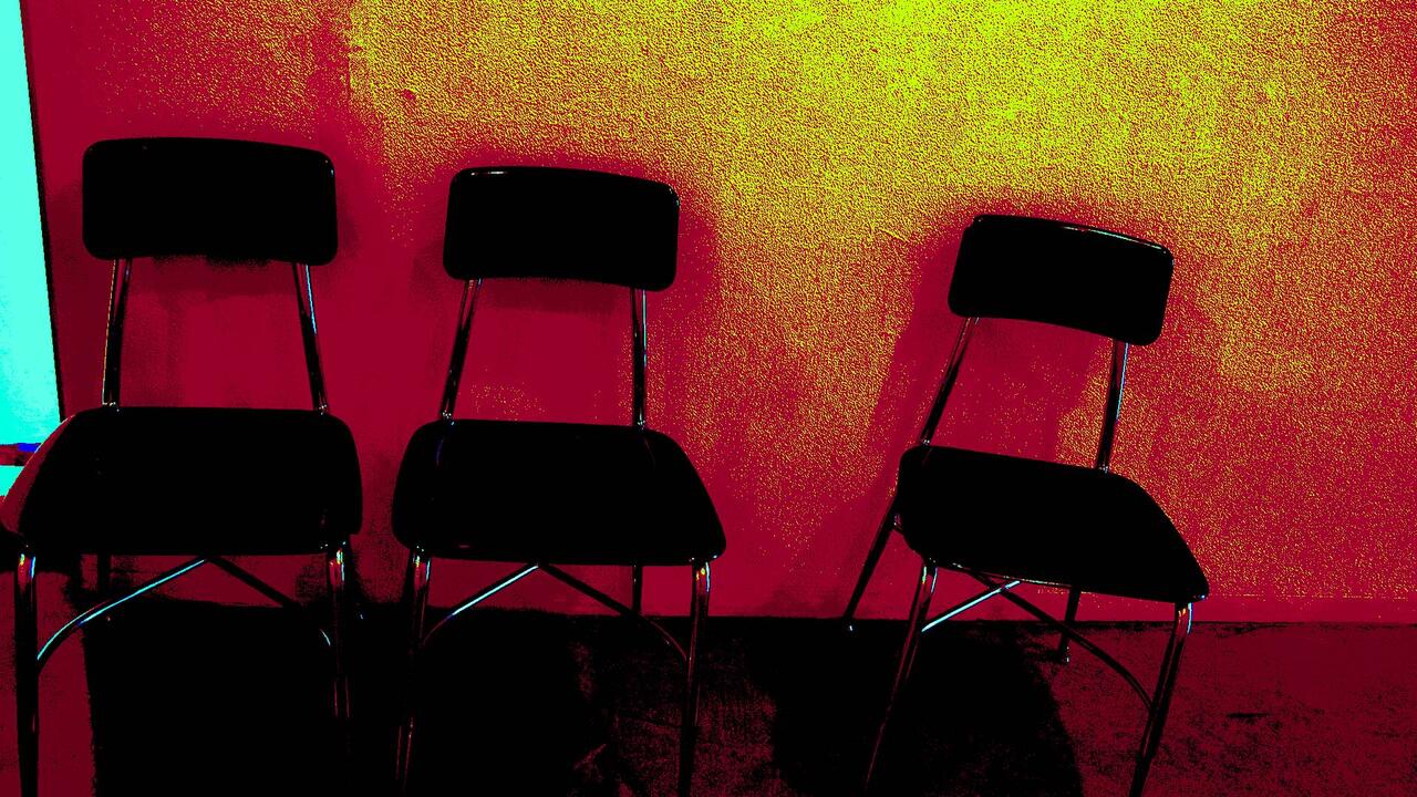 Red Chairs photo by Jada Montanez