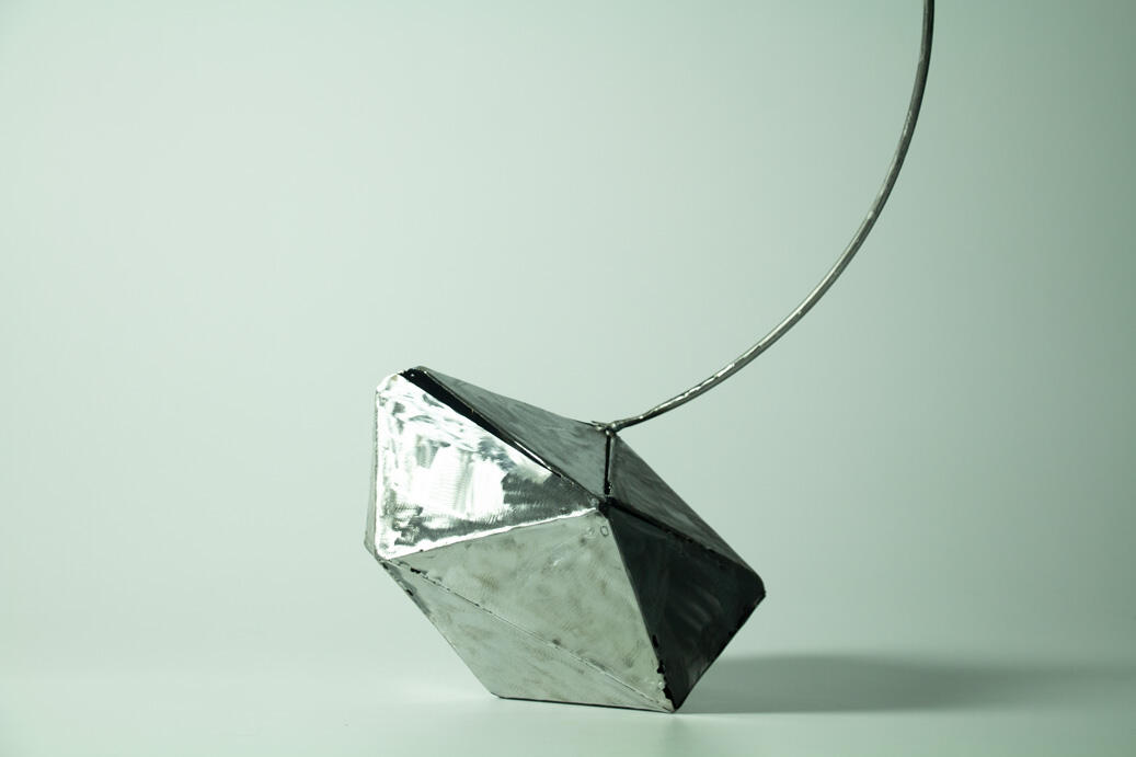 Cherry metal sculpture by Nicolas Araya
