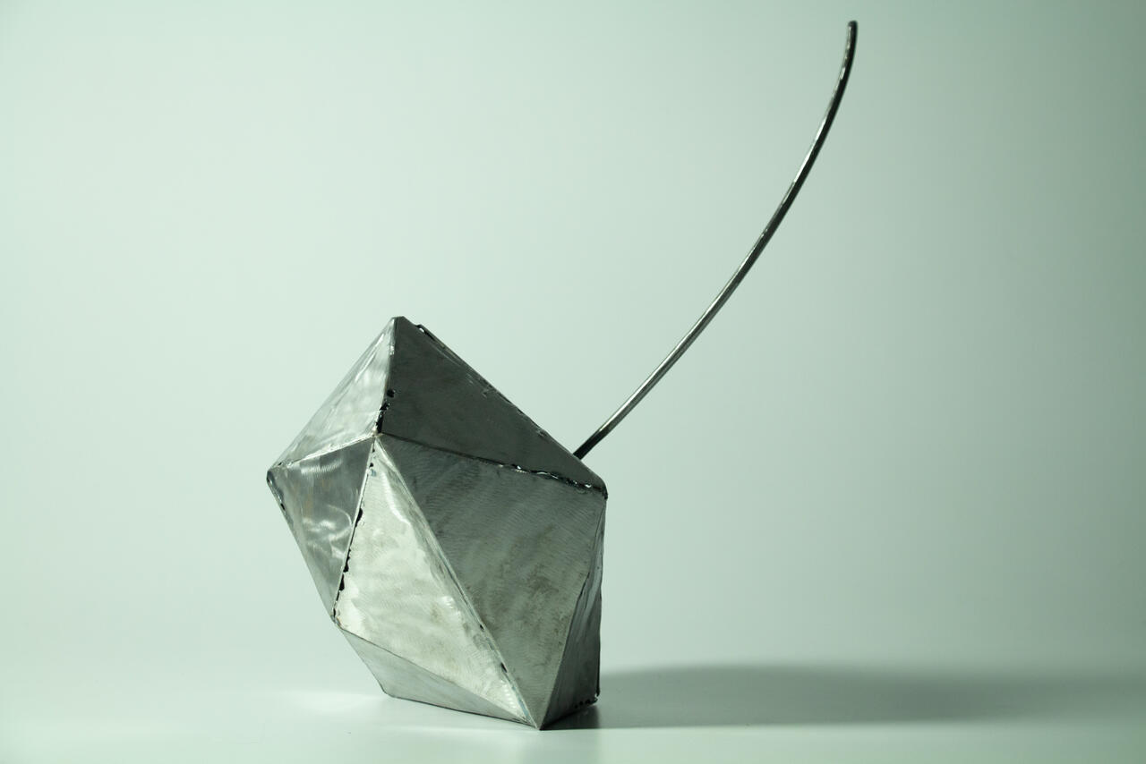 Cherry metal sculpture by Nicolas Araya